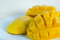 Mango nicely cut on wooden background (Also known as horse mango