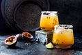 Mango passionfruit margarita cocktail with lime. Tropical alcoholic drink for summer