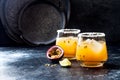 Mango passionfruit margarita cocktail with lime. Tropical alcoholic drink for summer