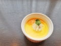 Mango pudding in white cup Royalty Free Stock Photo