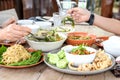 Mango salad , Nam Prik Ong , Dinner on wooden floor. Royalty Free Stock Photo