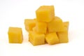 mango slice cut to cubes isolated on white Royalty Free Stock Photo