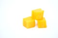 mango slice cut to cubes isolated on white Royalty Free Stock Photo