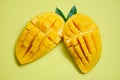 Mango slice and mango leaves from tree tropical summer fruit concept - Sweet ripe mangos cut half Royalty Free Stock Photo