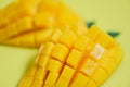 Mango slice tropical summer fruit concept - Close up of sweet ripe mangos cut half Royalty Free Stock Photo