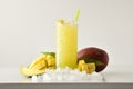 Mango slush drink with fruit and ice and isolated background Royalty Free Stock Photo