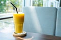 mango smoothie glass in cafe Royalty Free Stock Photo
