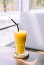 mango smoothie glass in cafe Royalty Free Stock Photo