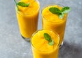 mango smoothie in tall glasses Royalty Free Stock Photo