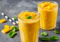 mango smoothie in tall glasses Royalty Free Stock Photo