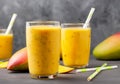 mango smoothie in tall glasses Royalty Free Stock Photo