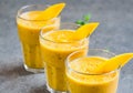 mango smoothie in tall glasses Royalty Free Stock Photo