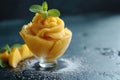 Mango sorbet in a glass on the table . Popsicle in a glass