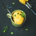 Mango sorbet ice cream scoops with mint, square crop Royalty Free Stock Photo