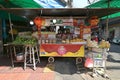 Push-cart stall selling mango glutinous \'sticky\' rice, cut pomelo & Thai desserts along the street, Chinatown, Bangkok