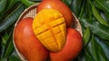 Mango, tropical fruit, in a bamboo wooden sieve basket on green leaf background, top view, full frame, beautiful, ripe harvest Royalty Free Stock Photo