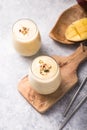 Mango Turmeric Lassie, yogurt or smoothie. Healthy probiotic cold summer drink