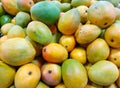 Mangoes randomly stacked in prododuce section in a grocery store Royalty Free Stock Photo