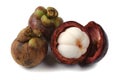 Mangosteen cross section showing thick purple skin and white flesh the queen of friuts.