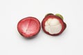 A mangosteen fruit on white background whic is a fresh mangosteen.