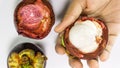 Mangosteen on hand Royalty Free Stock Photo