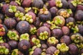 Mangosteen tropical fruit sale at street market in Thailand