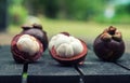 Mangosteens on a wooden table