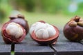 Mangosteens on a wooden table