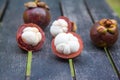 mangosteens on a wooden table