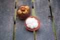 mangosteens on a wooden table