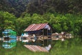 Mangrove jungle. Kayaking station. Fisher house at water