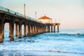 Manhattan Beach pier with ocean waves, Los Angeles, California Royalty Free Stock Photo