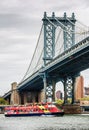 Manhattan Bridge and CitySightseeing Skyline Cruise boat
