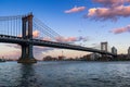 Manhattan Bridge and the East River at sunset. New York City Royalty Free Stock Photo