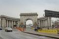 Manhattan Bridge Entrance While it is Snowing. Arch and Colonnade Entrance in Chinatown, New York City