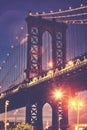 Manhattan Bridge with lens flares seen from Brooklyn at dusk, New York Royalty Free Stock Photo