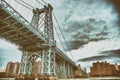 The Manhattan Bridge in New York City as seen from a ferry boat navigating East River Royalty Free Stock Photo