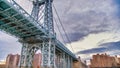 The Manhattan Bridge in New York City as seen from a ferry boat navigating East River Royalty Free Stock Photo