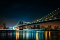 Manhattan Bridge at night, seen from Brooklyn Bridge Park, in Br