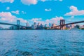 Manhattan and Brooklyn bridges on background of the New York City in vibrant colorful anime style