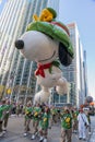 Annual Macy's Thanksgiving Parade on 6th Avenue. Snoopy cartoon Balloon