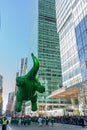 Annual Macy\'s Thanksgiving Parade on 6th Avenue. Baby Dino balloon