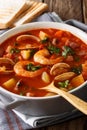 Manhattan chowder soup with shellfish and bacon close-up on Royalty Free Stock Photo