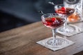 Manhattan classic cocktail as a short drink aperitif with whisky, vermouth, angostura aromatic bitter and cherry garnish Royalty Free Stock Photo