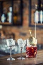 Manhattan cocktail drink decorated on bar counter in pub or rest Royalty Free Stock Photo