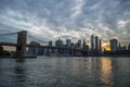 Manhattan Downtown Financial District Skyline and Brooklyn Bridge as Seen from Mainstreet Park in Brooklyn at Sunset Royalty Free Stock Photo