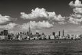 Manhattan Midtown West skyline in Black & White with skyscrapers and clouds in Summer. New York City