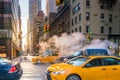 Manhattan morning sunrise view with yellow cabs