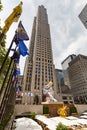 Manhattan, New York, July 10, 2017: Seated Ballerina by Jeff Koons, at Rockefeller center and buildings in Manhattan