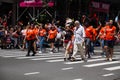 Manhattan, New York, June, 2017: group of orange shirts in The Gay Pride Parade